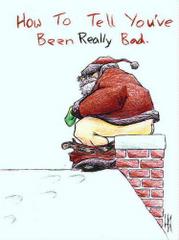 Mikołaj siedzący na kominie 