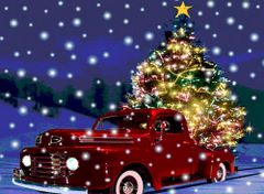 Świecąca choinka na czerwonym aucie